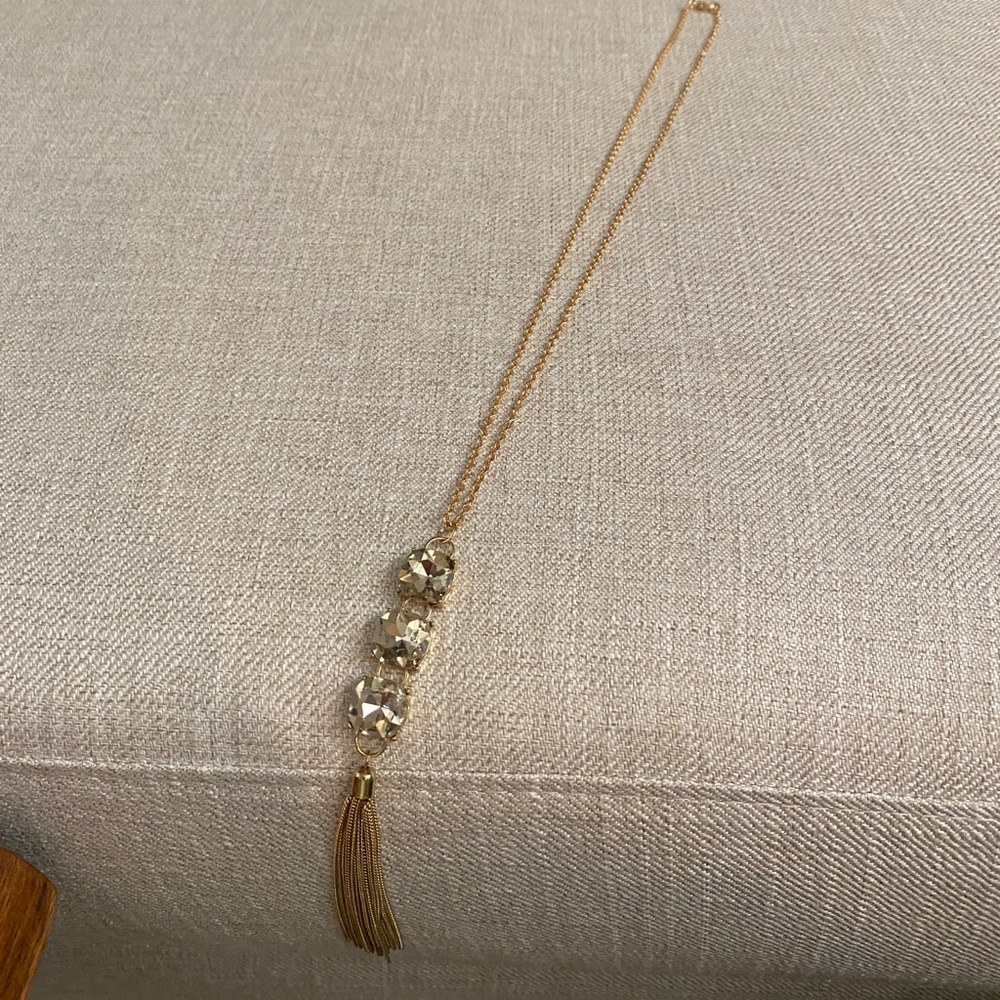Long gold necklace with tassel